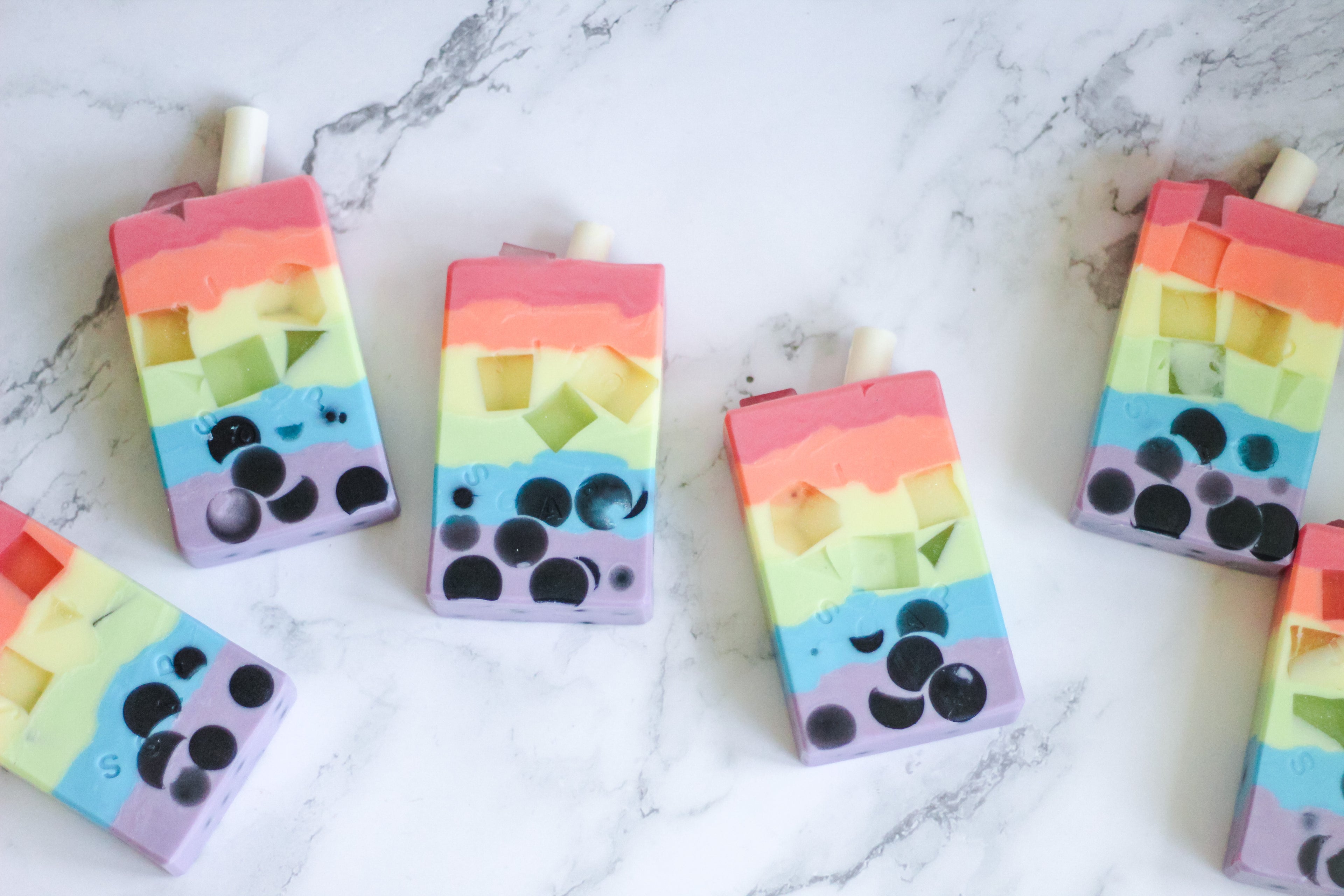 super fun rainbow layered boba vegan soap with sparkly ice cubes and wide bubble tea straw